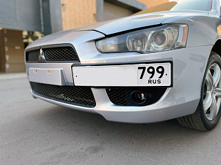 Рамка под номер на передний бампер Mitsubishi Lancer X (2007-2010)