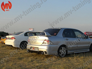 Задний бампер Mitsubishi Lancer IX в стиле INGS Extreem под двойной выхлоп (2003-2009)