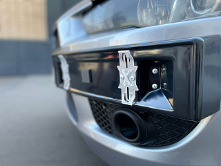 Рамка под номер на передний бампер Mitsubishi Lancer X (2007-2010)