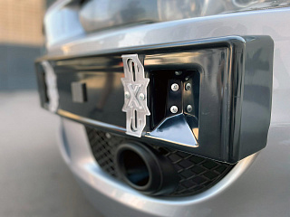 Рамка под номер на передний бампер Mitsubishi Lancer X (2007-2010)