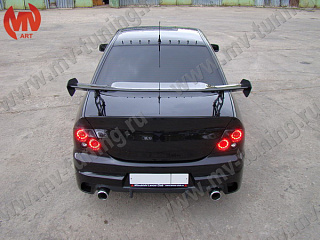 Задний бампер Mitsubishi Lancer IX в стиле INGS Extreem под двойной выхлоп (2003-2009)