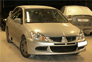 Передний бампер Mitsubishi Lancer 9 IX в стиль EVO (2003-2009)