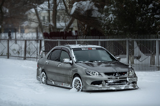 Передний бампер Mitsubishi Lancer 9 IX в стиль EVO (2003-2009)