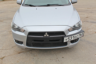 Рамка под номер на передний бампер Mitsubishi Lancer X (2007-2010)